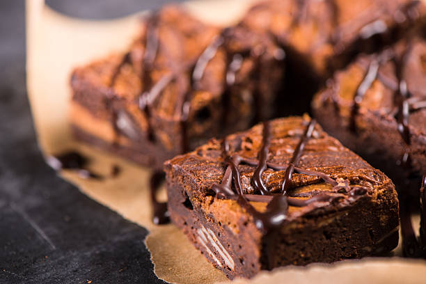 Homemade artisan dark chocolate brownies stock photo