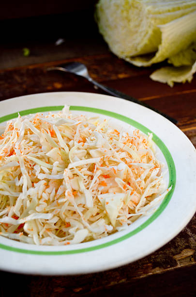 istock pickled cabbage and carrots in a white plate 492424814