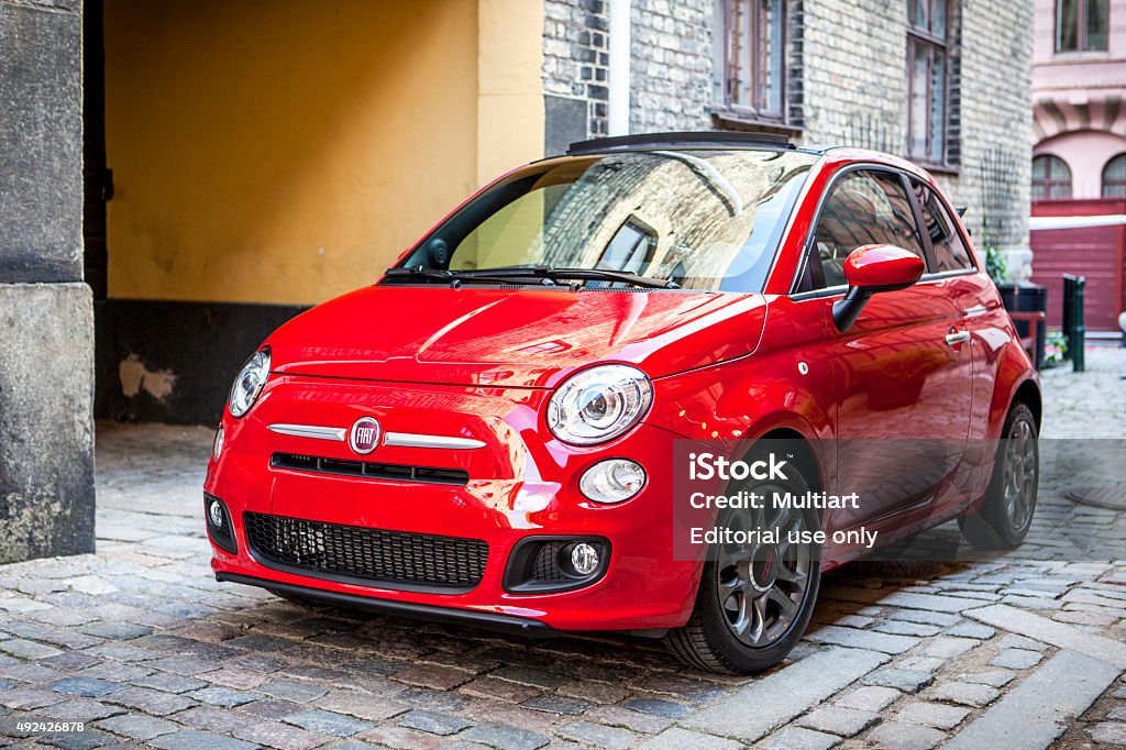 Fiat 500 engine Malmoe, Sweden - September 10, 2013: A brand new Fiat 500 parked in a street in Malmoe. Fiat 500 Stock Photo