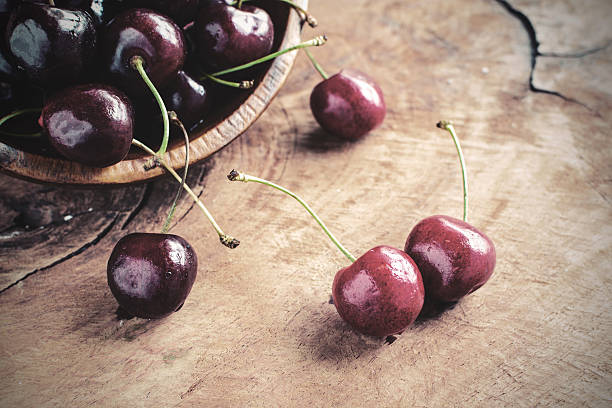 istock Group of Fresh cherry on wooden table 492426956