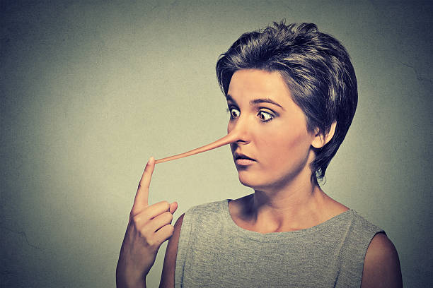 istock Woman with long nose. Liar concept 492426974