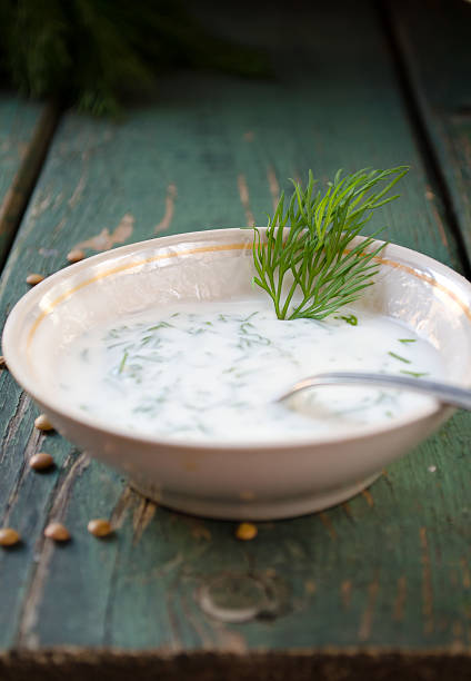 istock Bowl of fresh yogurt dip with dill and garlic 492427588