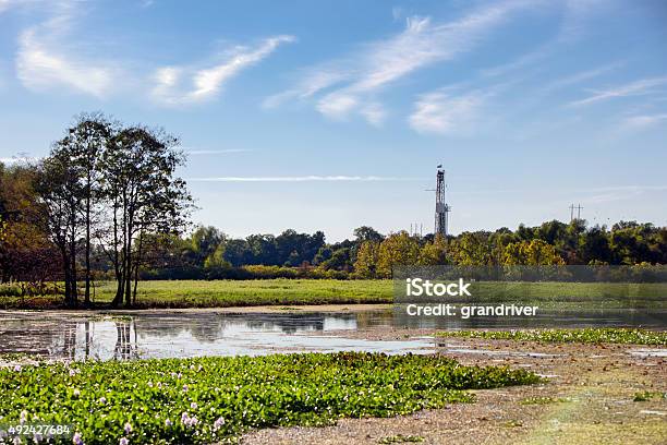 Fracking Drilling Rig Near A Louisiana Bayou Stock Photo - Download Image Now - Louisiana, Crude Oil, Drilling Rig