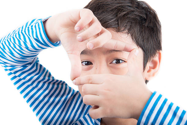 istock Little boy showing hand ok close up pose 492429030