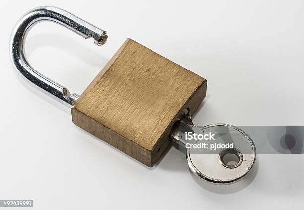 Old Silver Key In Old Brass Padlock Stock Photo - Download Image Now - Brass, Horizontal, Key