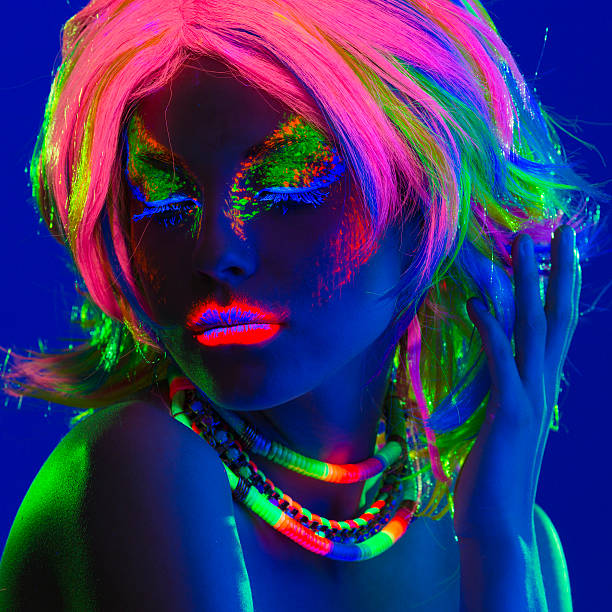 istock Women Portrait in Ultraviolet Light 492441019