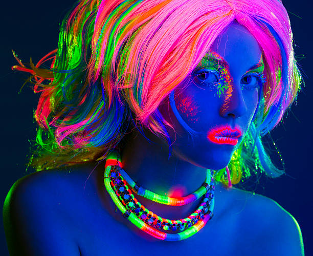 istock Women Portrait in Ultraviolet Light 492441021