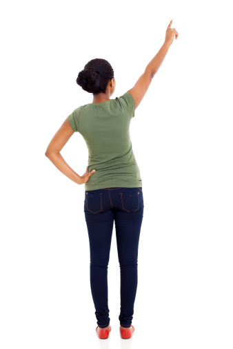 rear view of african american woman pointing empty space