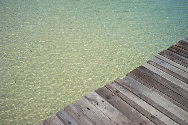 istock Wood bridge and sea  background with space for text 492443507