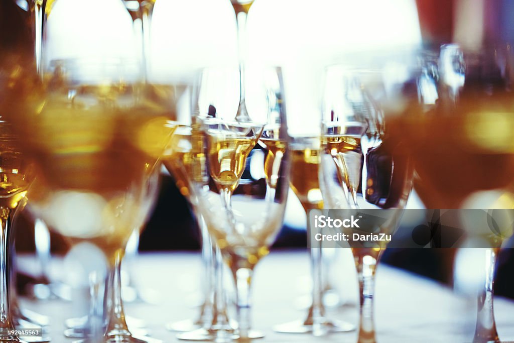 Celebration. Abstract picture of champagne glasses. Celebration. Abstract picture of champagne glasses. Gently toned, vintage colors, selective focus. Abstract Stock Photo