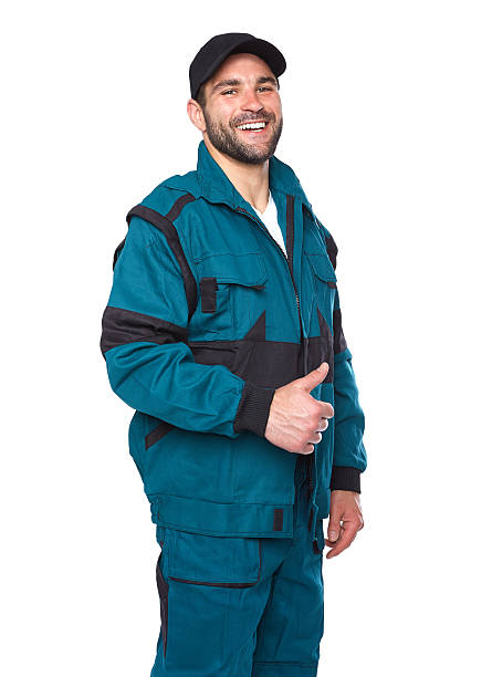 istock Portrait of smiling worker in green uniform 492445725