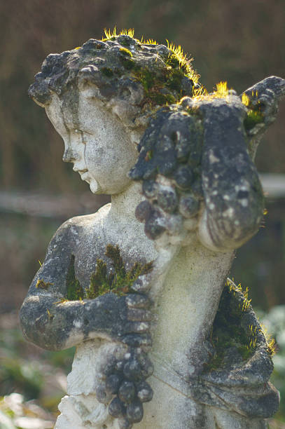 istock Angel With Grapes - Sculpture 492446475