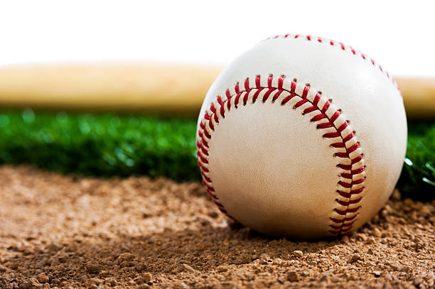 istock Tightly focused, unused baseball, against grass background 492446937