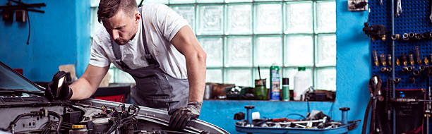 istock Man repairing a car 492452106