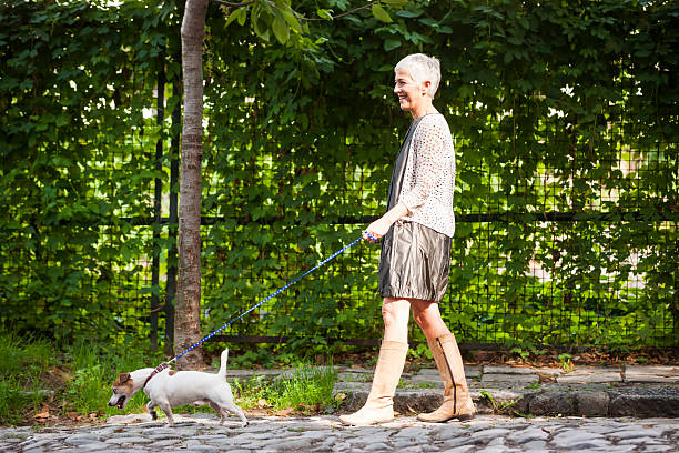istock Woman with dog 492453898
