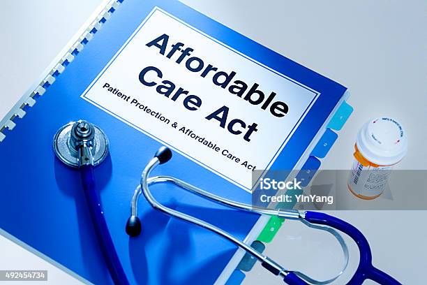 Open Enrollment Insurance Obamacare Patient Protection Affordable Care Act Guide Stock Photo - Download Image Now