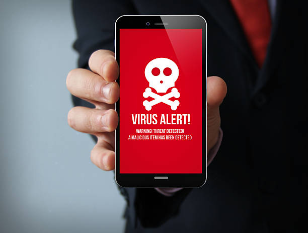 istock virus businessman smartphone 492457010