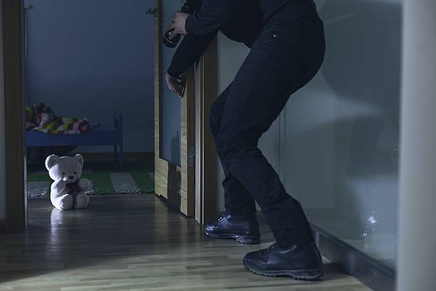 istock Man breaking into child's bedroom 492457522