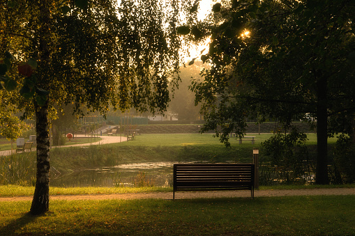 The sun rises over the park. Elk, Poland.