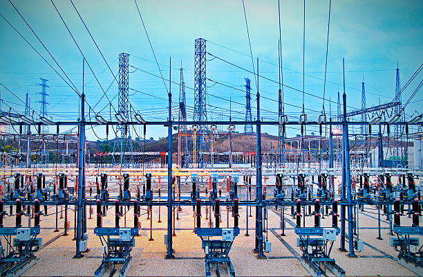 Electric power substation Power station for making Electricity. Shot before sunrise with cable red hot electricity substation photos stock pictures, royalty-free photos & images