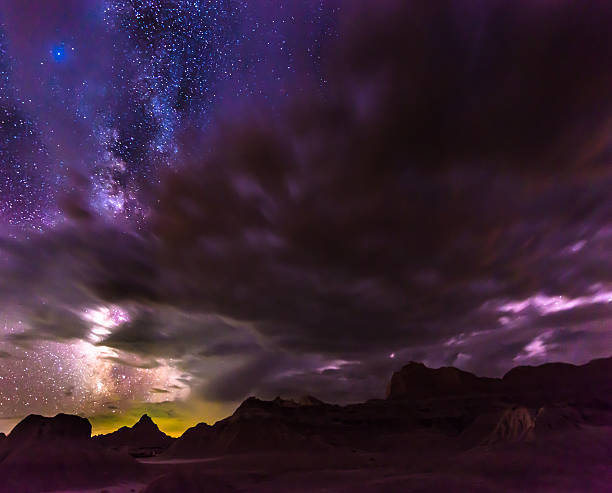 istock Beautiful Cloudy Night Badlands South Dakota 492489244