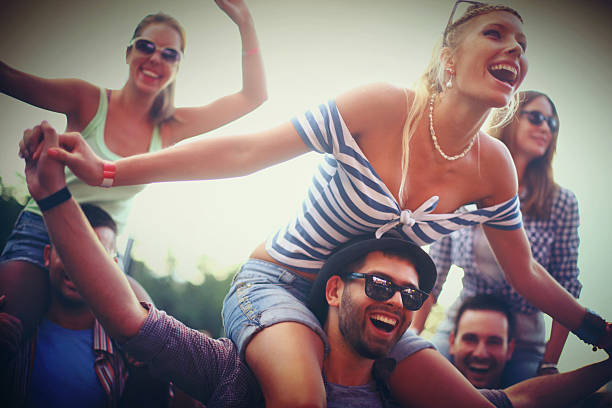 istock People enjoying concert party. 492491672
