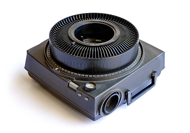 Vintage Slide Projector A vintage slide projector for slideshows and presentations. Isolated on white. slide projector photos stock pictures, royalty-free photos & images