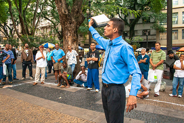 evangelical preacher Sao Paulo, Brazil, January 07, 2009. Man evangelical preacher explains God's Word in Se Square in downtown Sao Paulo evangelic stock pictures, royalty-free photos & images