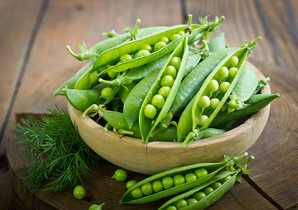 istock Fresh peas in the bowl 492494661
