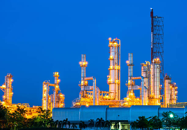 istock Oil refinery plant at night sky 492495127