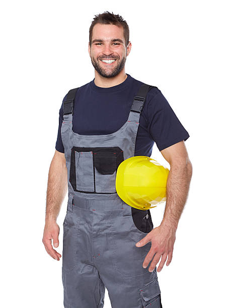 istock Portrait of smiling worker in gray uniform 492495135