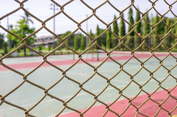 istock Metal mesh wire fence 492495605