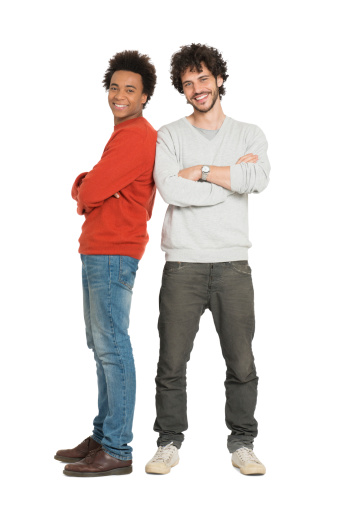 Portrait Of Two Young Men With Armcrossed Isolated On White Background