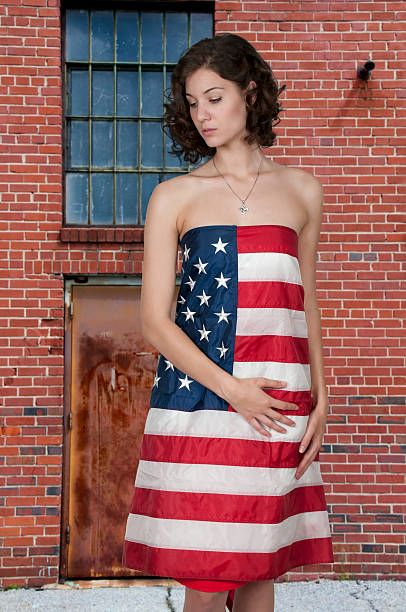 istock Woman Wrapped in a Flag 492497200