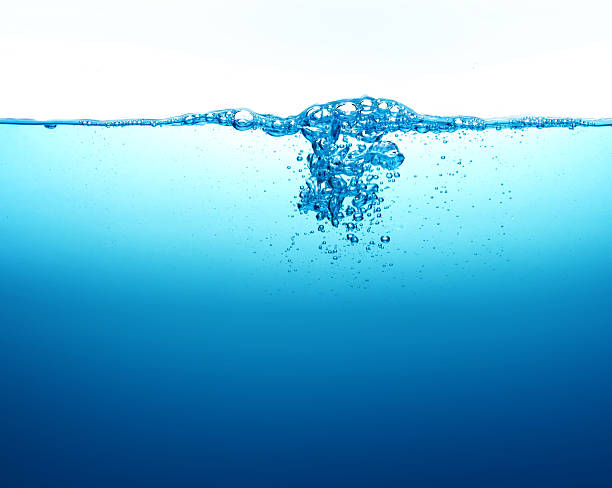 istock Close up blue Water splash with bubbles on white background 492498344