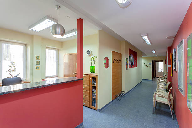 Waiting room Waiting room with reception in medical clinic medical office lobby stock pictures, royalty-free photos & images