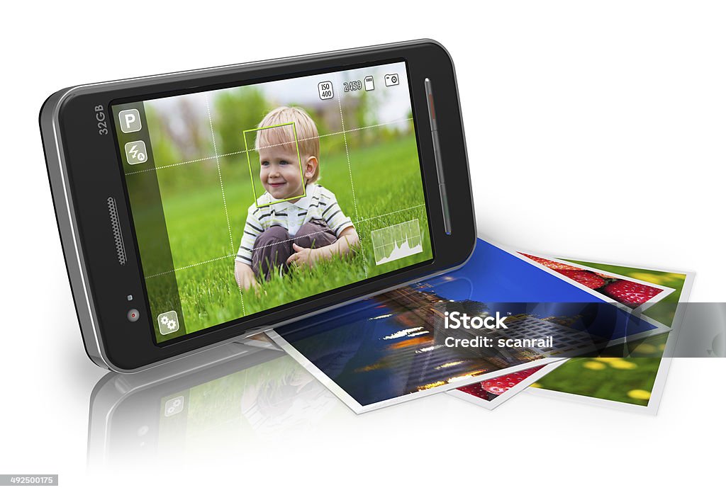 Mobile photography concept Mobile photography concept: touchscreen smartphone in camera mode and set of photos isolated on white reflective background Child Stock Photo