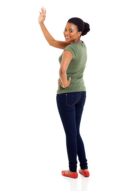 istock afro american woman waving goodbye 492500375