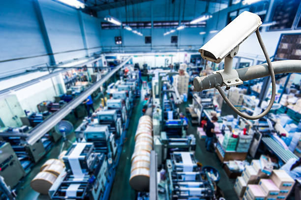 istock CCTV Camera or surveillance operating inside industrial factory 492500463