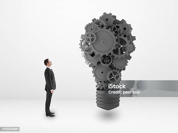 Man Looking To Metal Stock Photo - Download Image Now - Adult, Business, Business Person