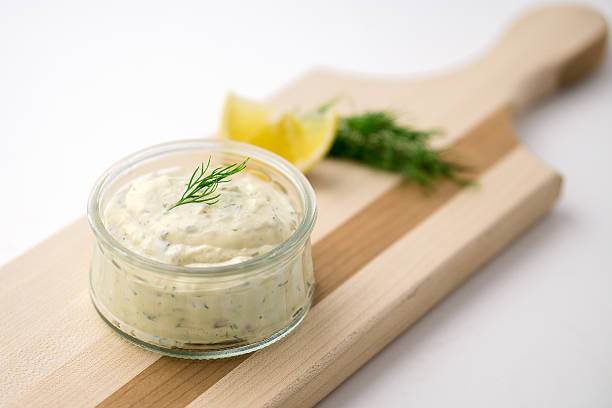 istock Tartar sauce on a wooden serving board 492508574