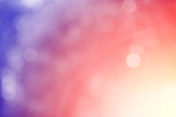 istock Red and purple glitter sparkle defocused rays lights bokeh 492508992