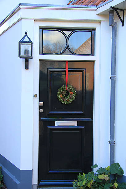 istock Front door with Christmas decorations 492509354