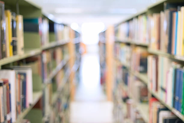 istock books on bookshelf, abstract blur background 492509886