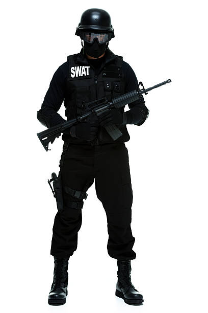 istock Police holding rifle and looking at camera 492510940