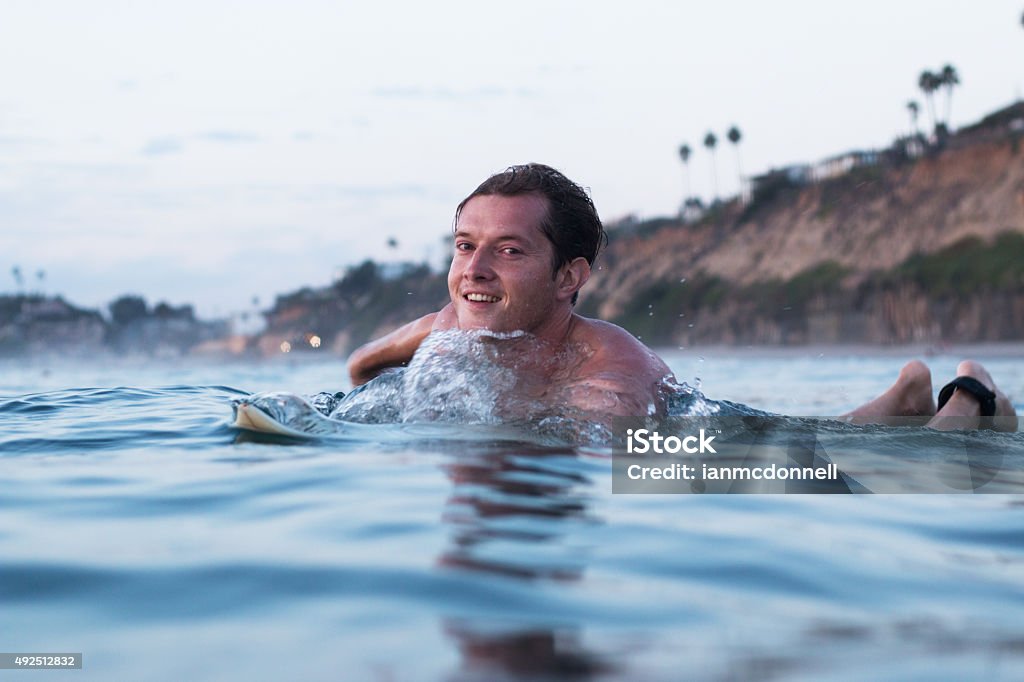 Paddling Happy surfer paddling Encinitas Stock Photo