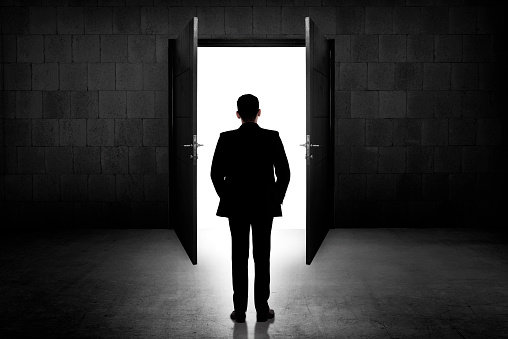 Business man going to the open door. Career path conceptual