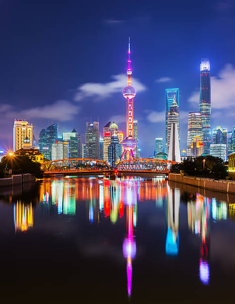 Modern Shanghai Shanghai's Modern Pudong District at Night promenade shanghai stock pictures, royalty-free photos & images