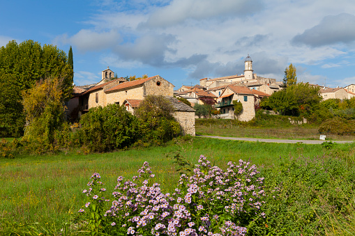 Sigonce, a little provencal village situated 9 km from Forcalquier. St Claude church (Église Saint-Claude de Sigonce), dates back to the 14th and 15th century on the left.