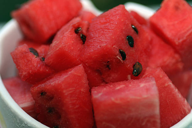 istock slices of watermelon in a bowl on a blurred background 492519660